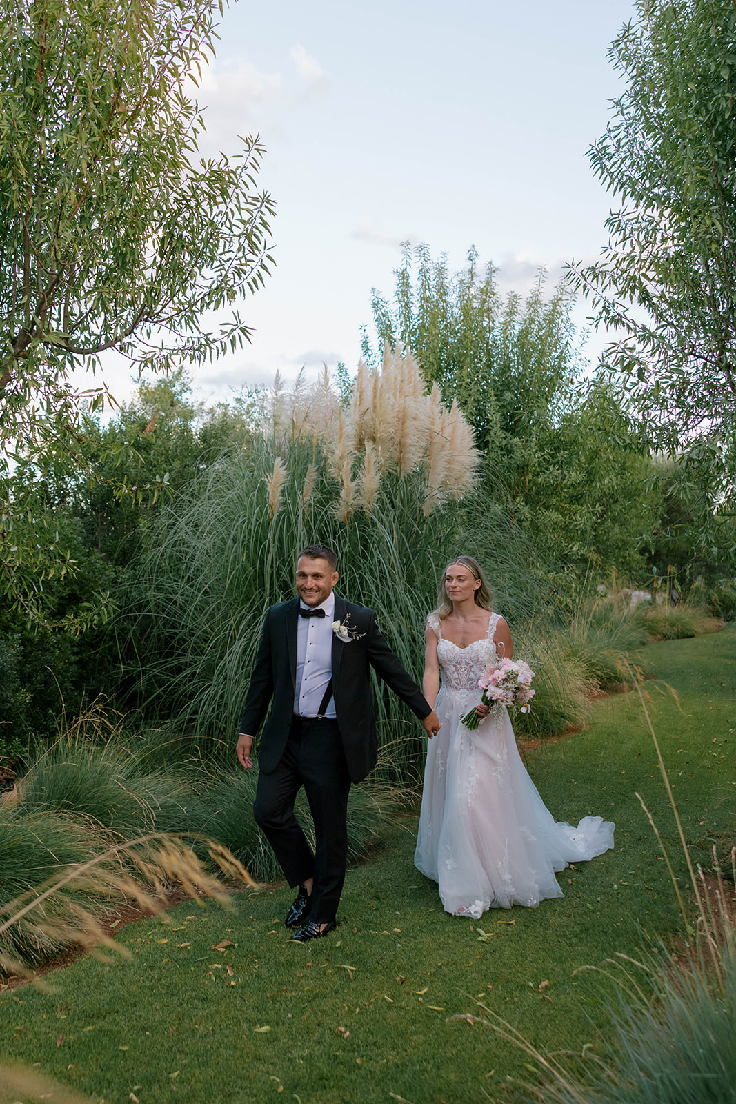 Wedding portraits on a garden path
