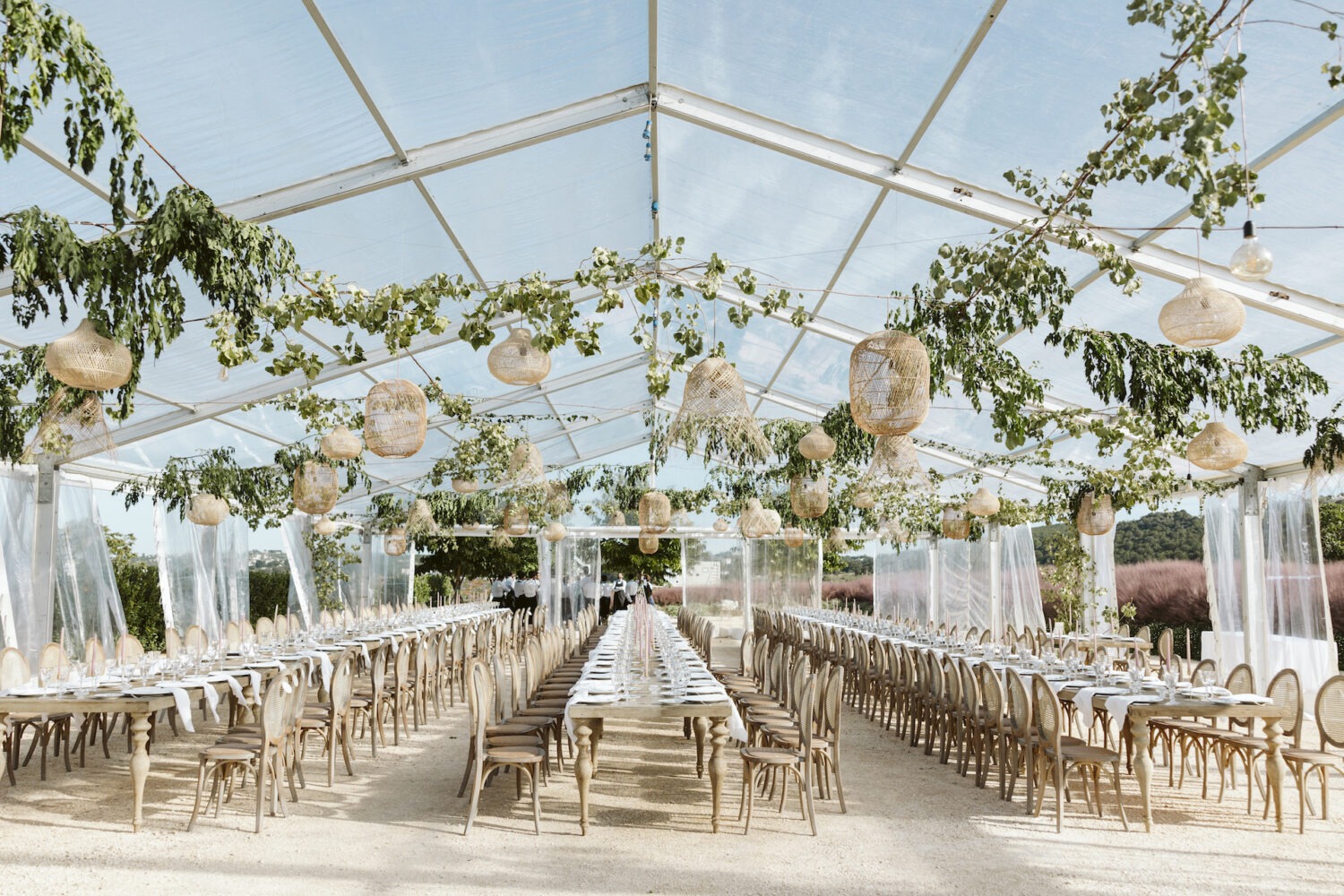 Wedding dinner setting beneath the crystal marquee at Giardini Pistola