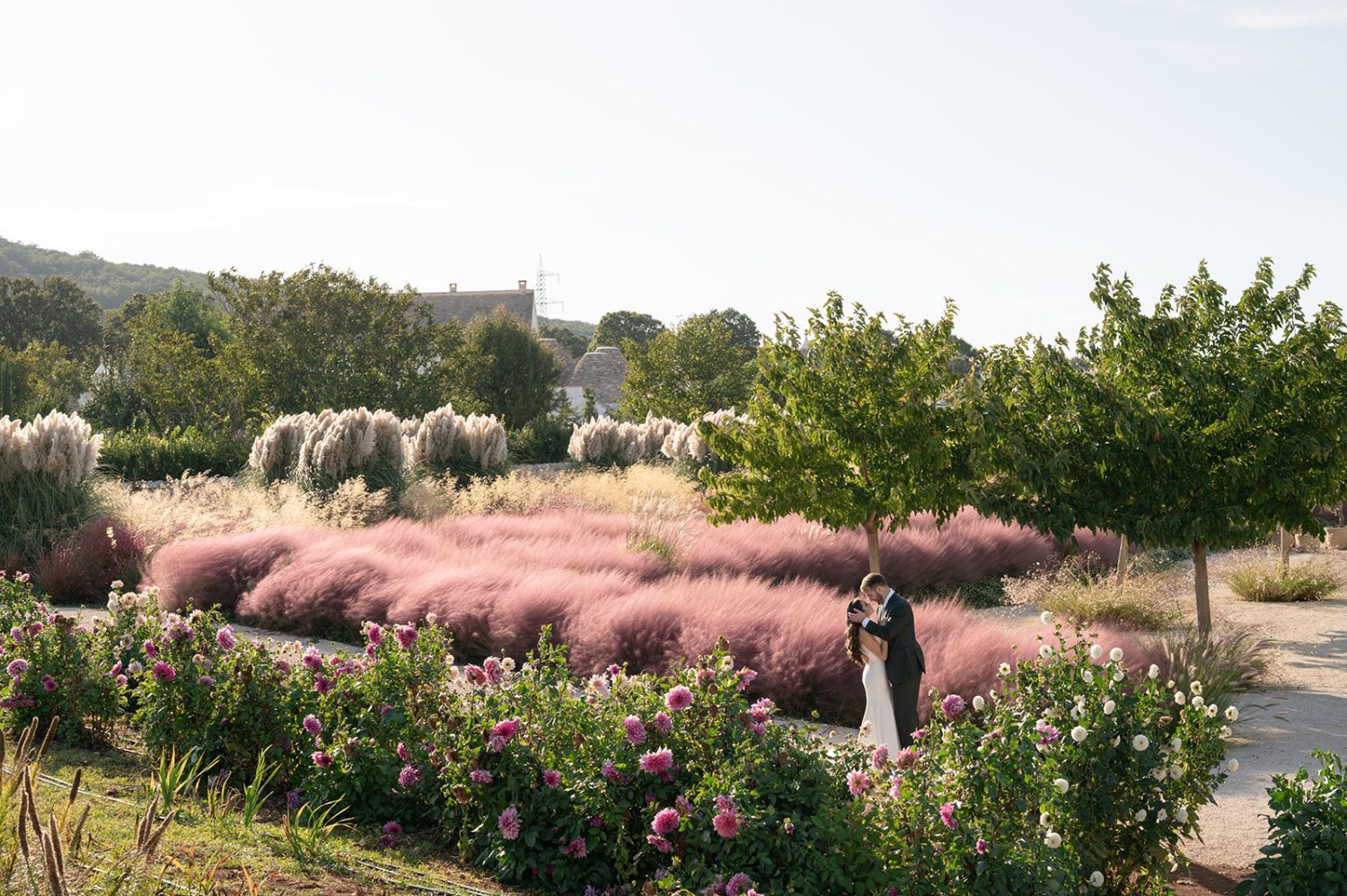 A wedding couple in the gardens at Pistola